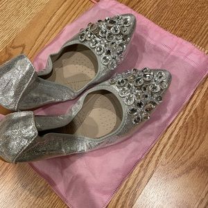 New in bag silver flats